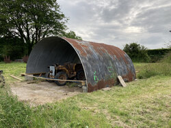 Beginning to reassemble on the POW Camp site.